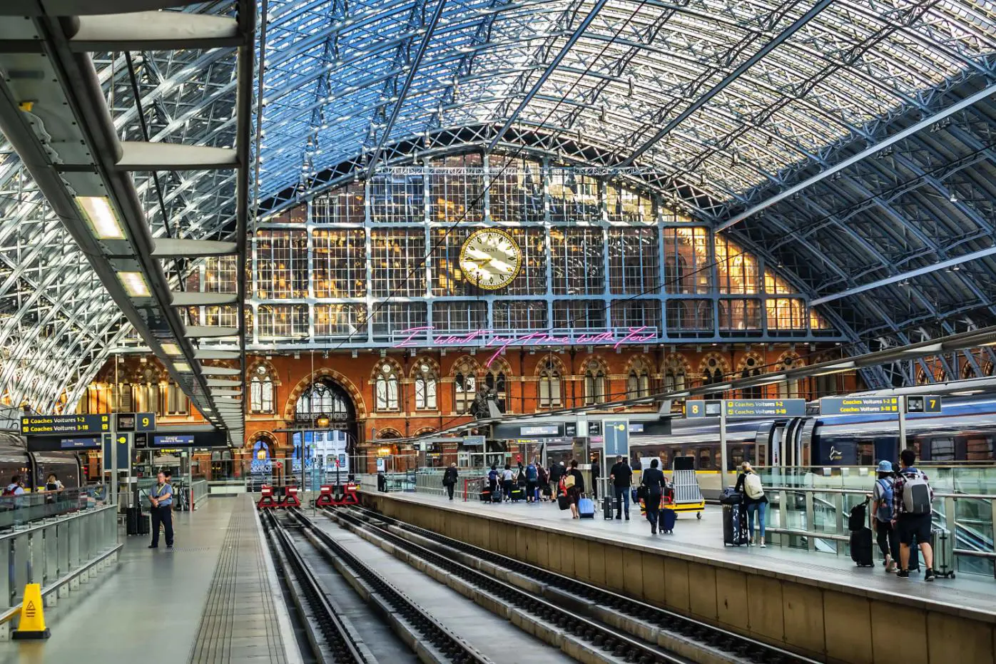 The Eurostar platforms at St Pancras International station in London, featuring the station’s iconic arched glass roof in the background