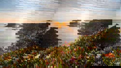 The sun sets near Noirmont Point