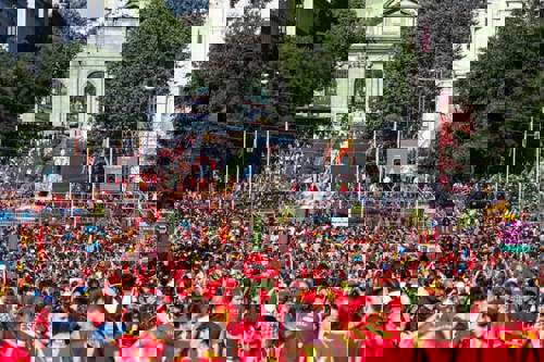 Excited Spanish fans celebrate in the Plaza de Cibeles in the victory of the Spanish football team.