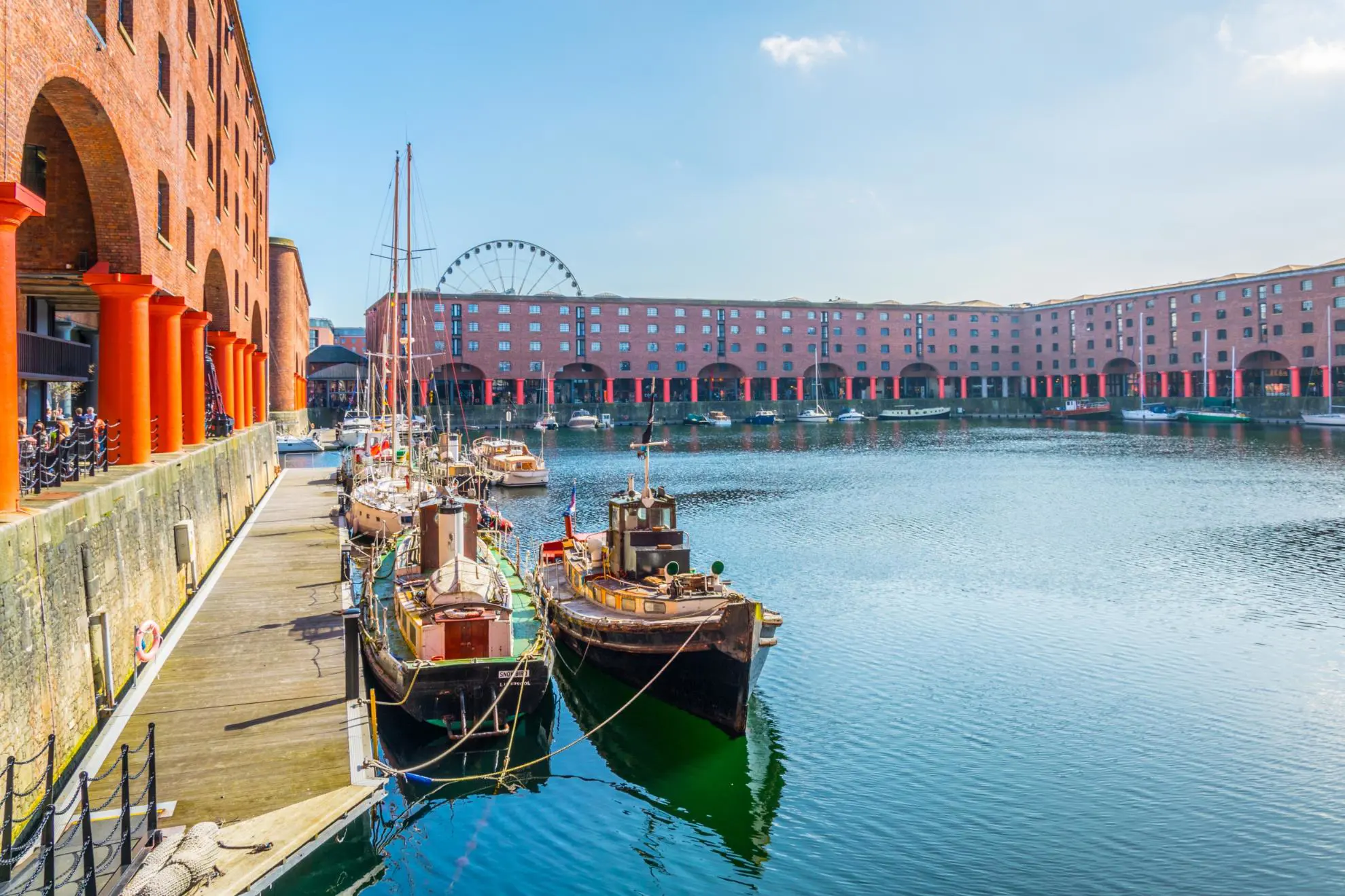 The Royal Albert Dock, Liverpool with boats in the harbour on a sunny day 