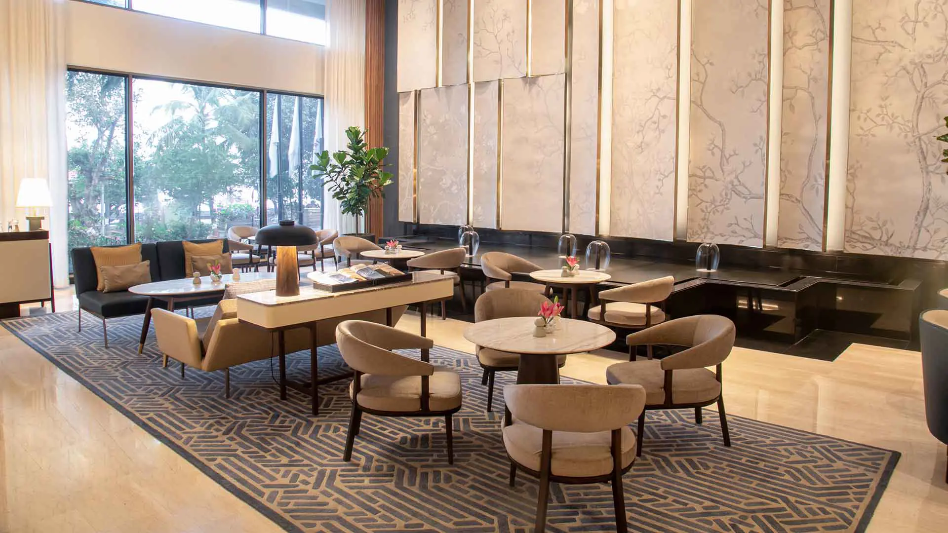 The Verandah bar at Trident Nariman Point, Mumbai, featuring comfortable lounge seating in neutral, sophisticated colours and a stylish, relaxed setting