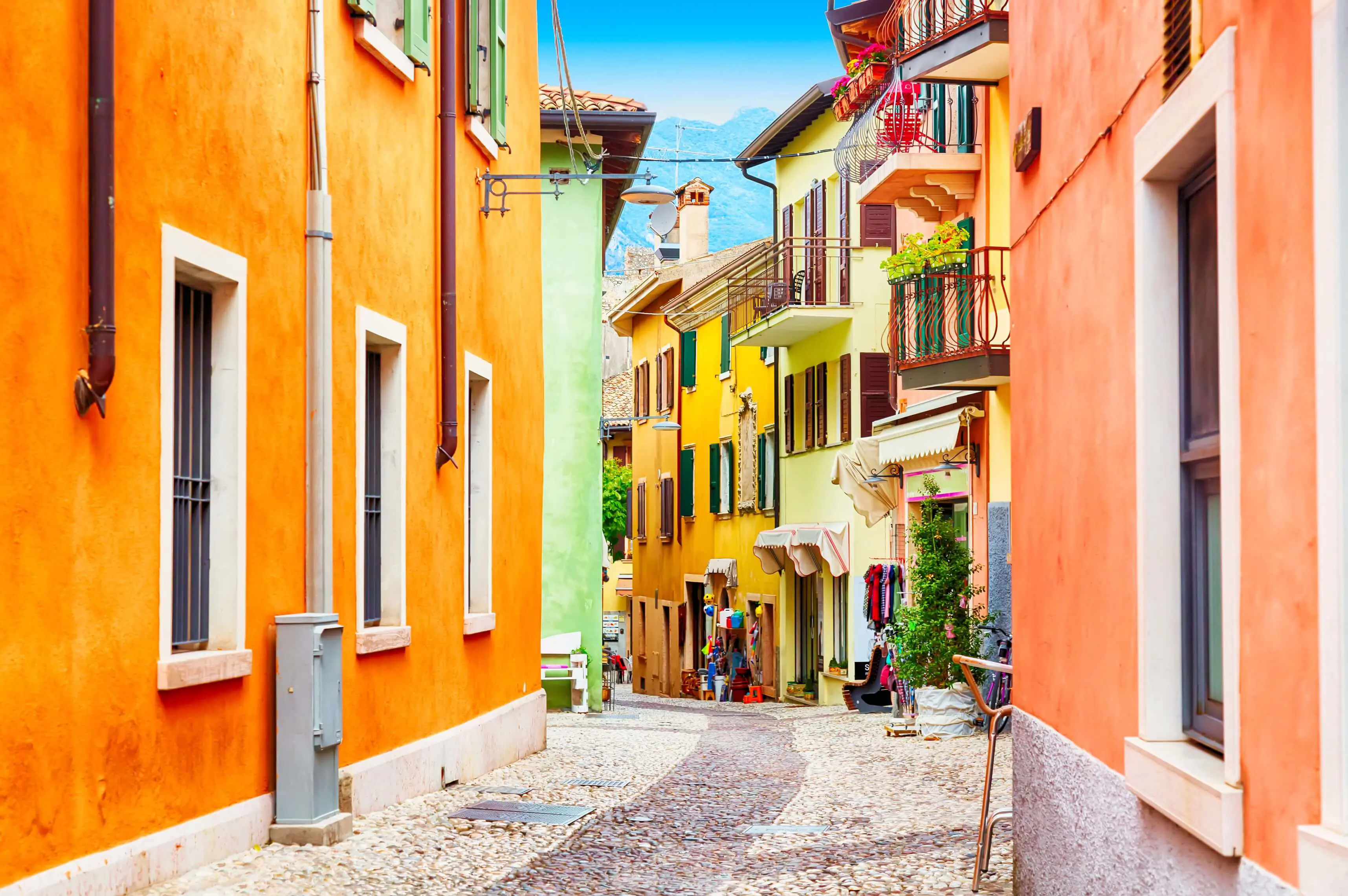 Small street in Malcesine, Lake Garda with colourful houses