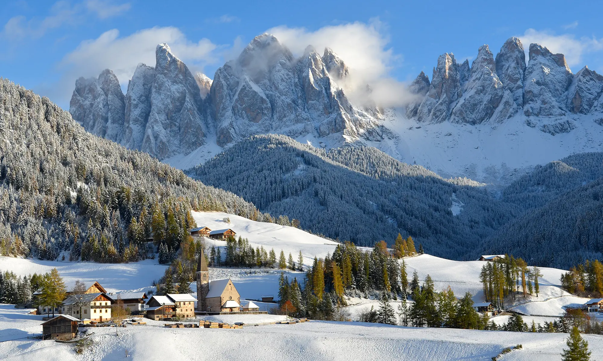 Dolomites in the snow in St Magdalena, Italy