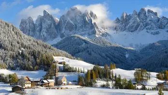Dolomites in the snow in St Magdalena, Italy