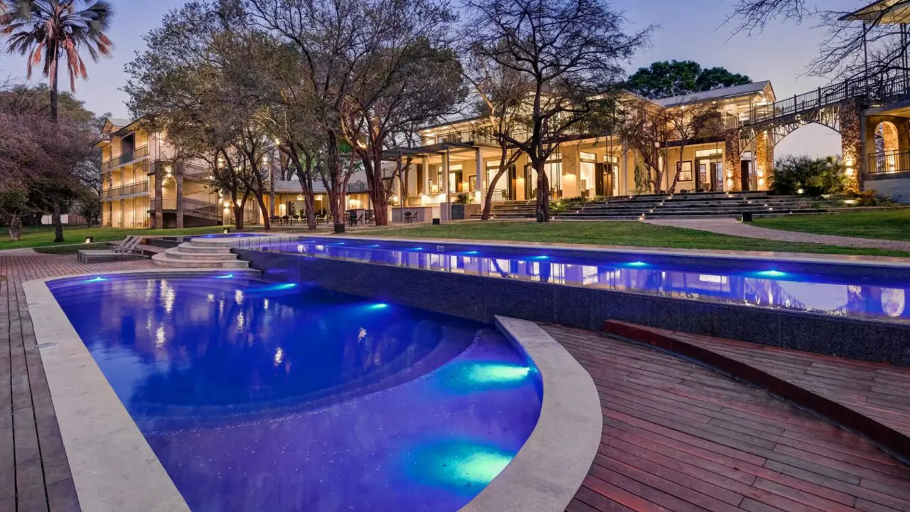 Palm River Hotel, Victoria Falls, pool at night