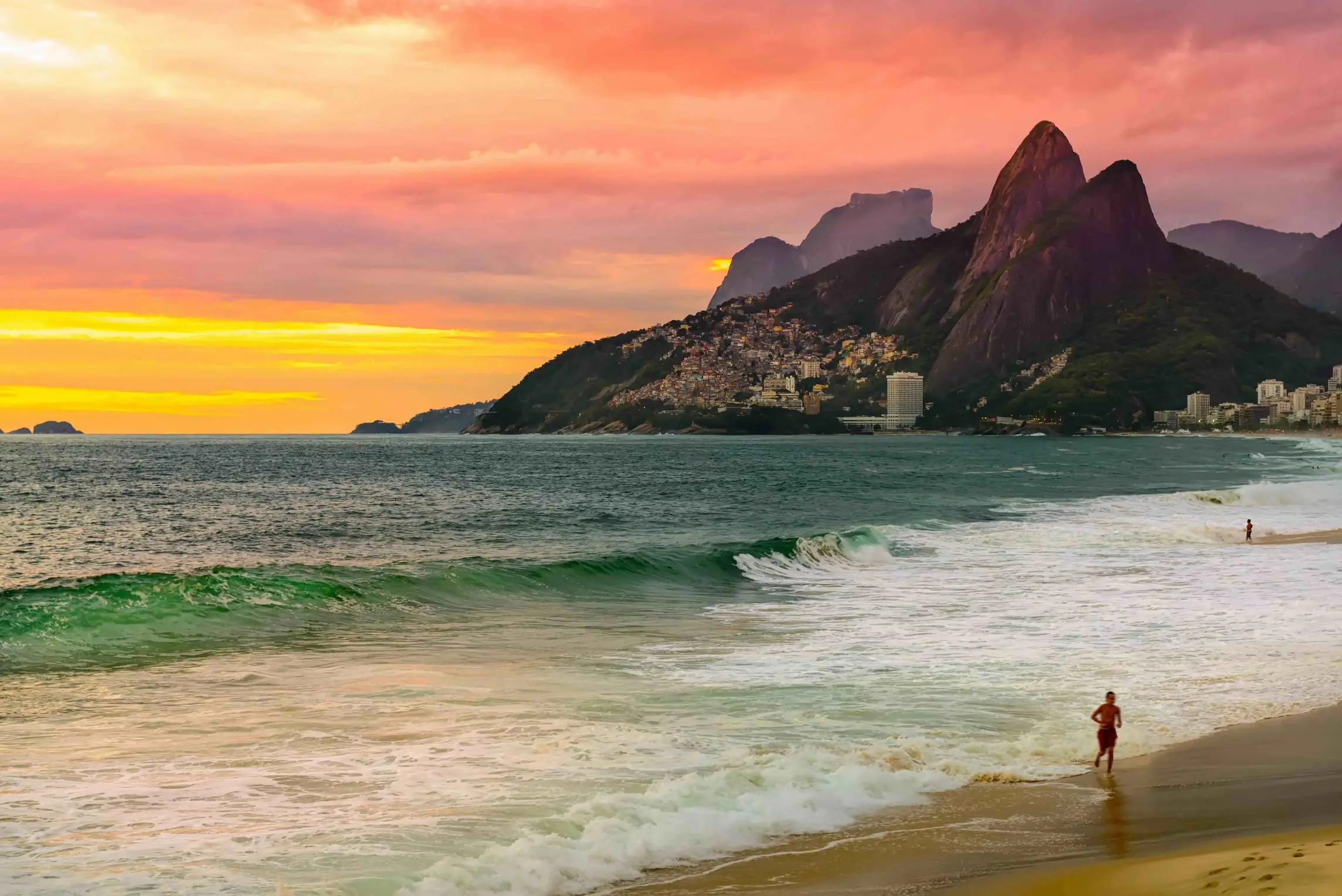 Vibrant view of a Rio de Janeiro beach with Sugarloaf Mountain rising in the background