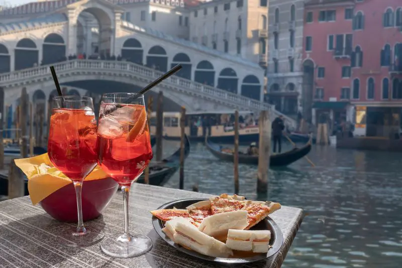 Food And Drink with a view of Rialto Bridge and the canal