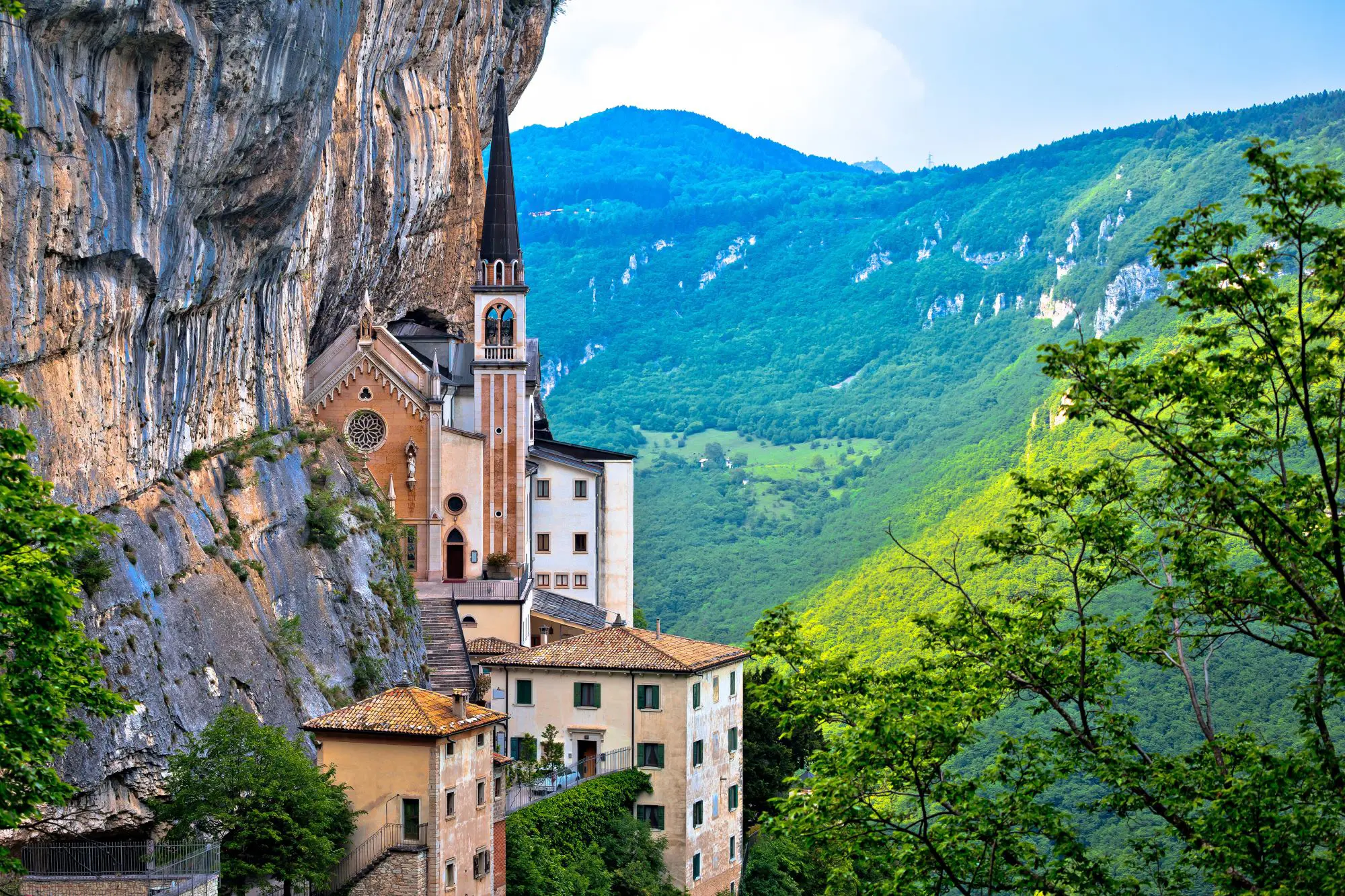 View of Madonna Della Corona church, amongst the mountains