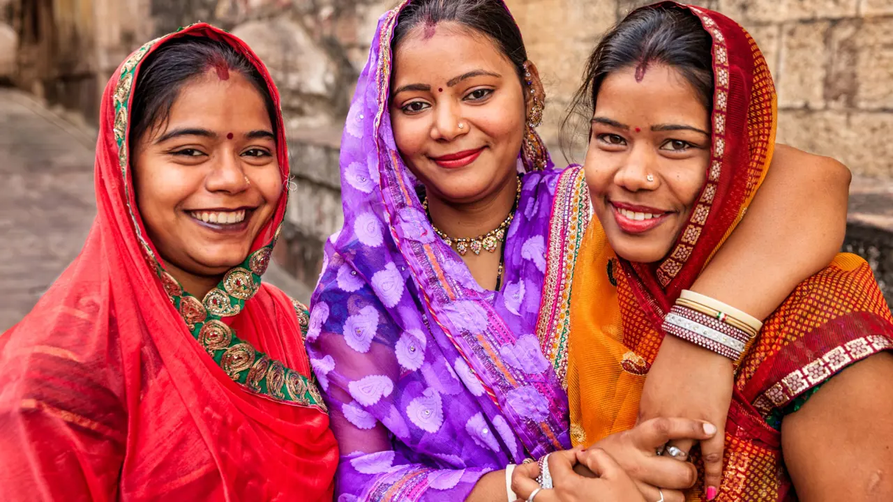 Indian women brightly dressed in beautiful saris