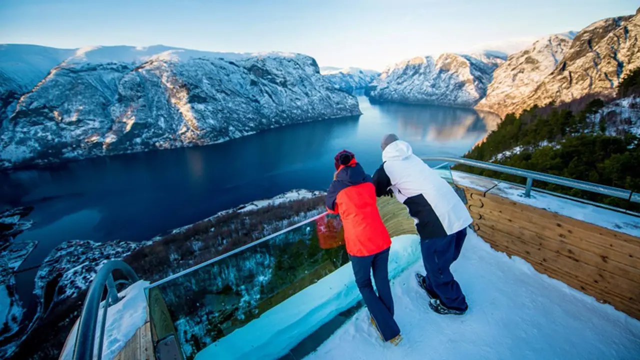 Two people looking out from Stegastein Viewing Platform