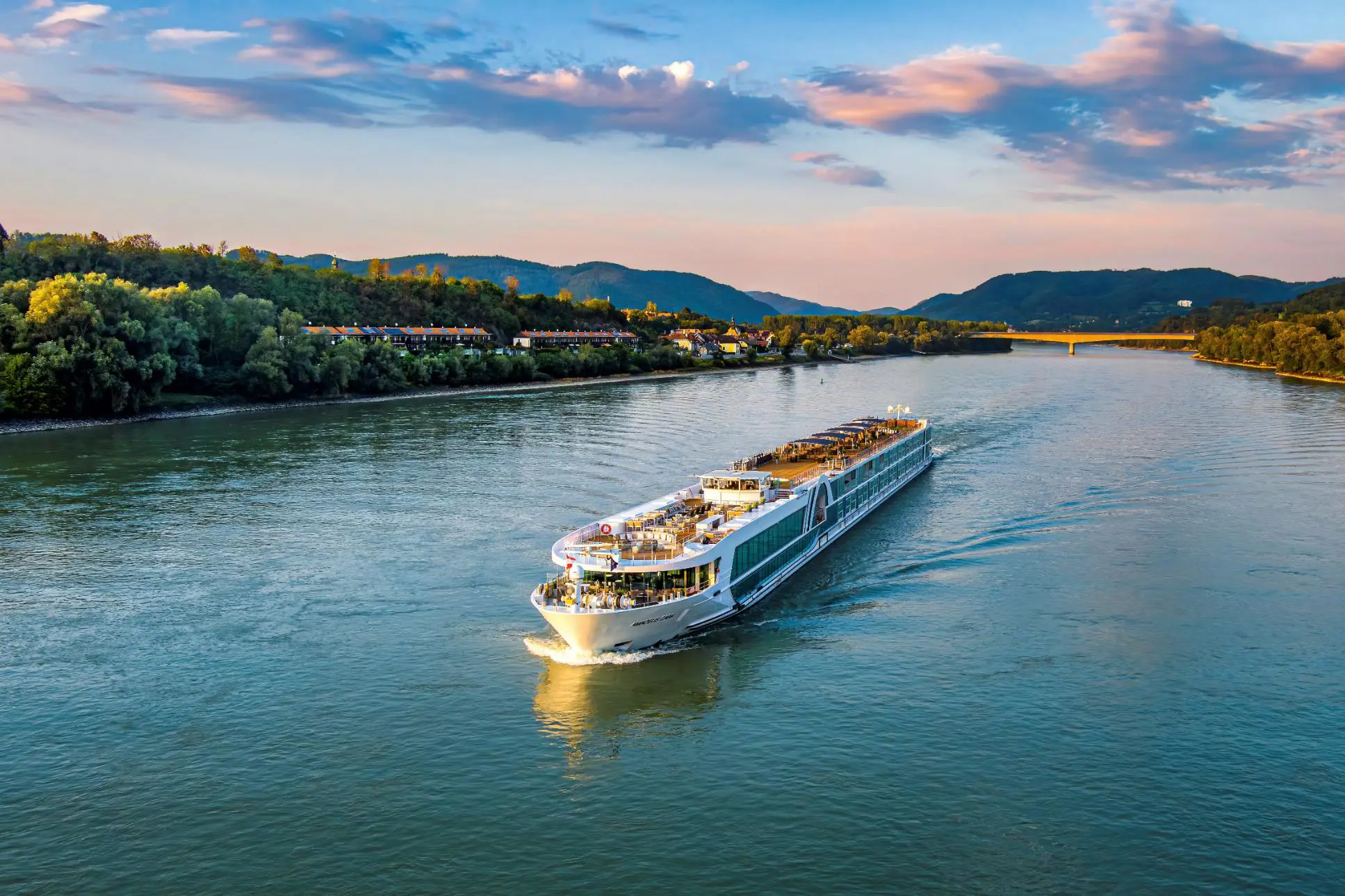 AMADEUS Cara Exterior View Day Wider Perspective Of The AMADEUS Cara On The River Pink Clouds Lueftner Cruises Amadeus Martin Skopal