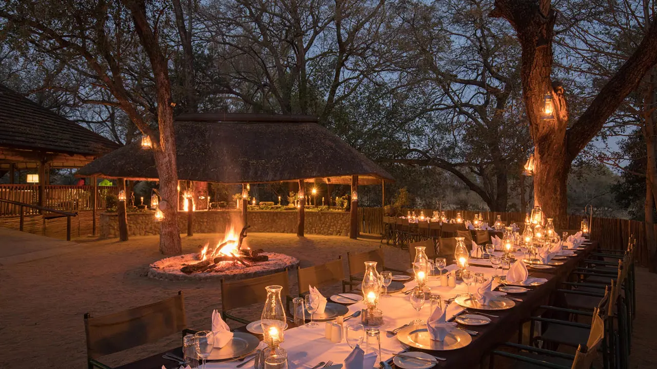 Chisomo Safari Camp, evening dining outside