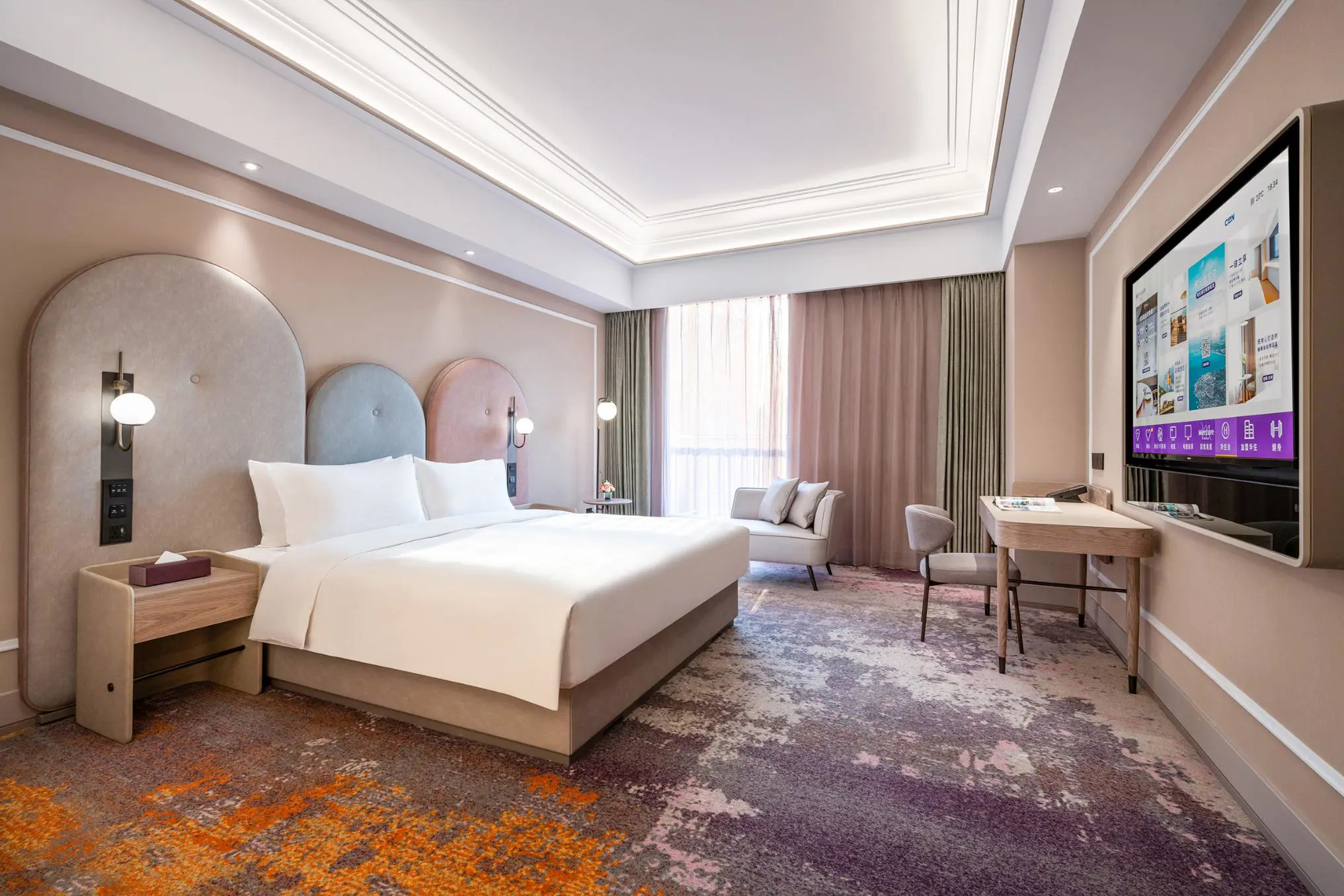 A stylish double room featuring a large bed, desk area and lounge seat next to the floor-to-ceiling window at the Mercure Beijing Downtown Hotel in Beijing, China