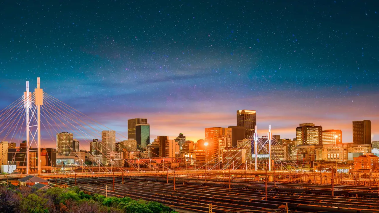 Nelson Mandela Bridge at night with Johannesburg city skyline in Gauteng