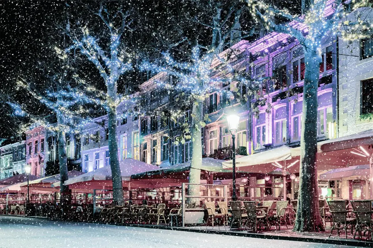 Christmas lights and snow on the Vrijthof Square in Maastricht 