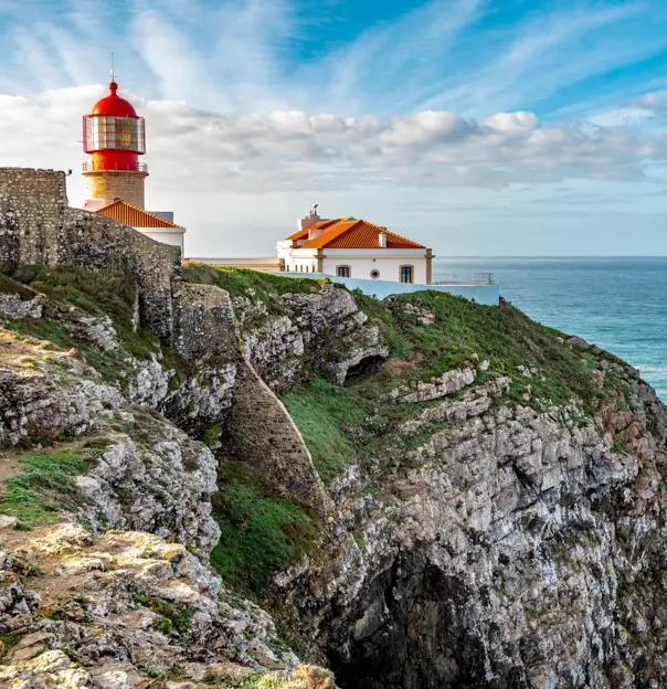 Lighthouse of Cape St. Vincent stands over the Atlantic Ocean in Southern Portugal
