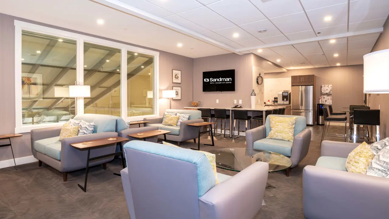 Bright and airy lounge at Sandman Signature Calgary Downtown, Calgary, featuring contemporary design and comfortable seating